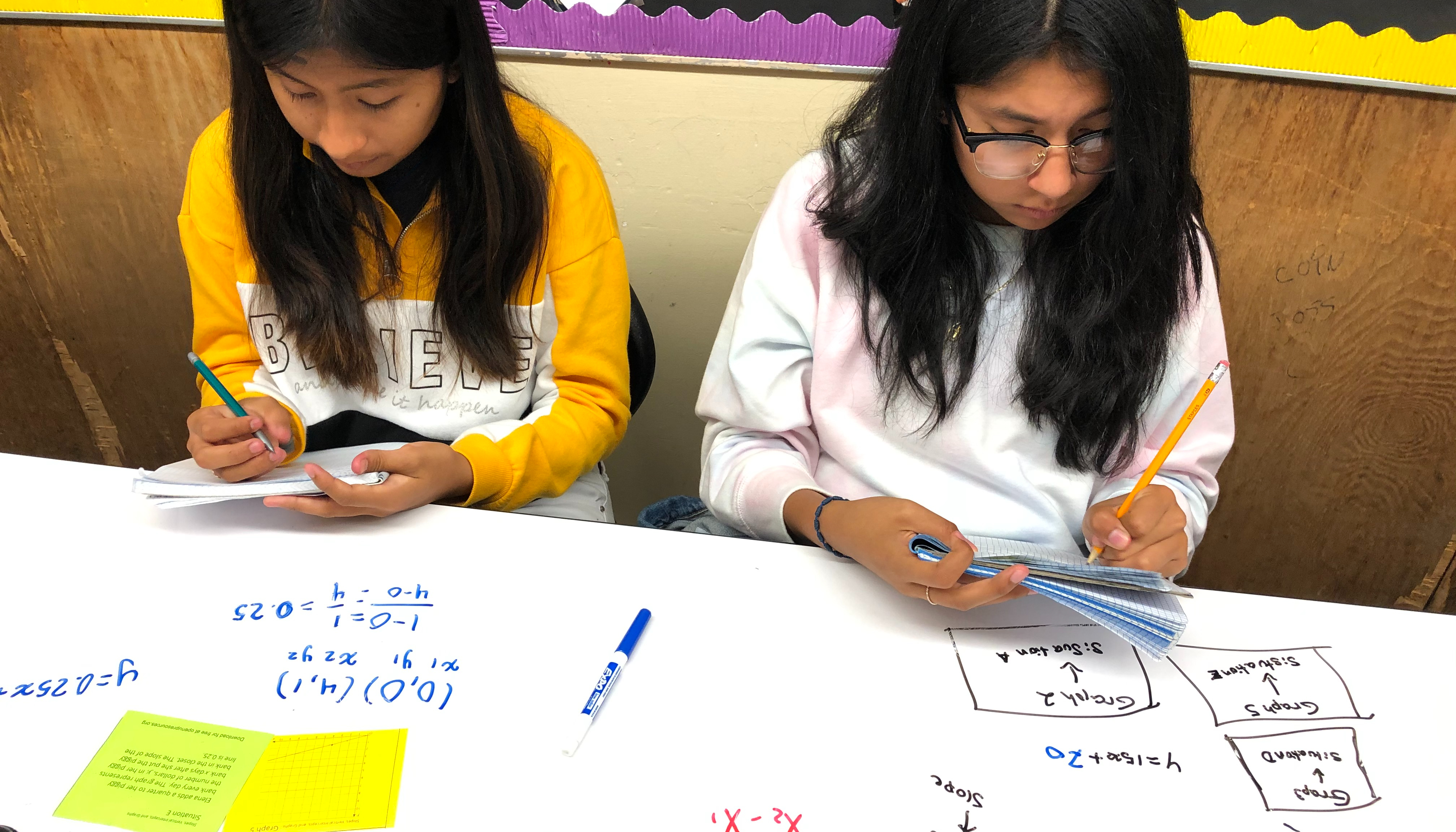 students doing math work